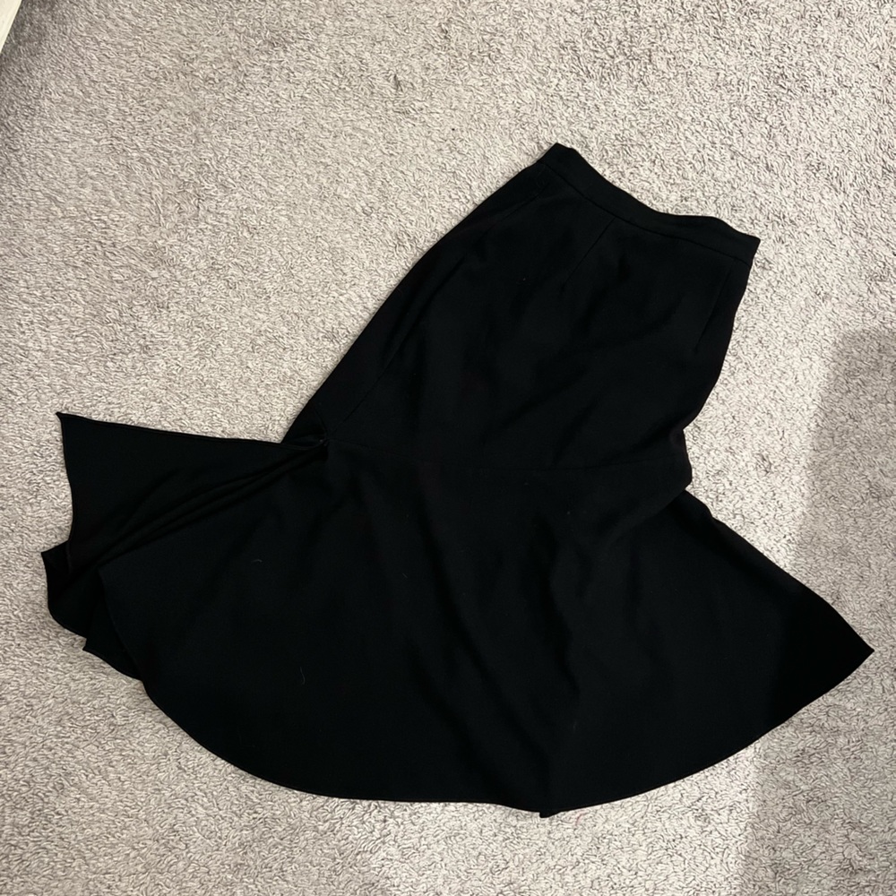 Asymmetrical, black midi skirt